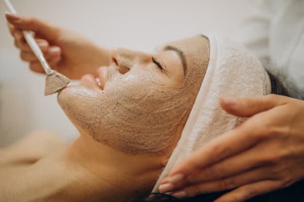 Skincare products and towels in a calm setting